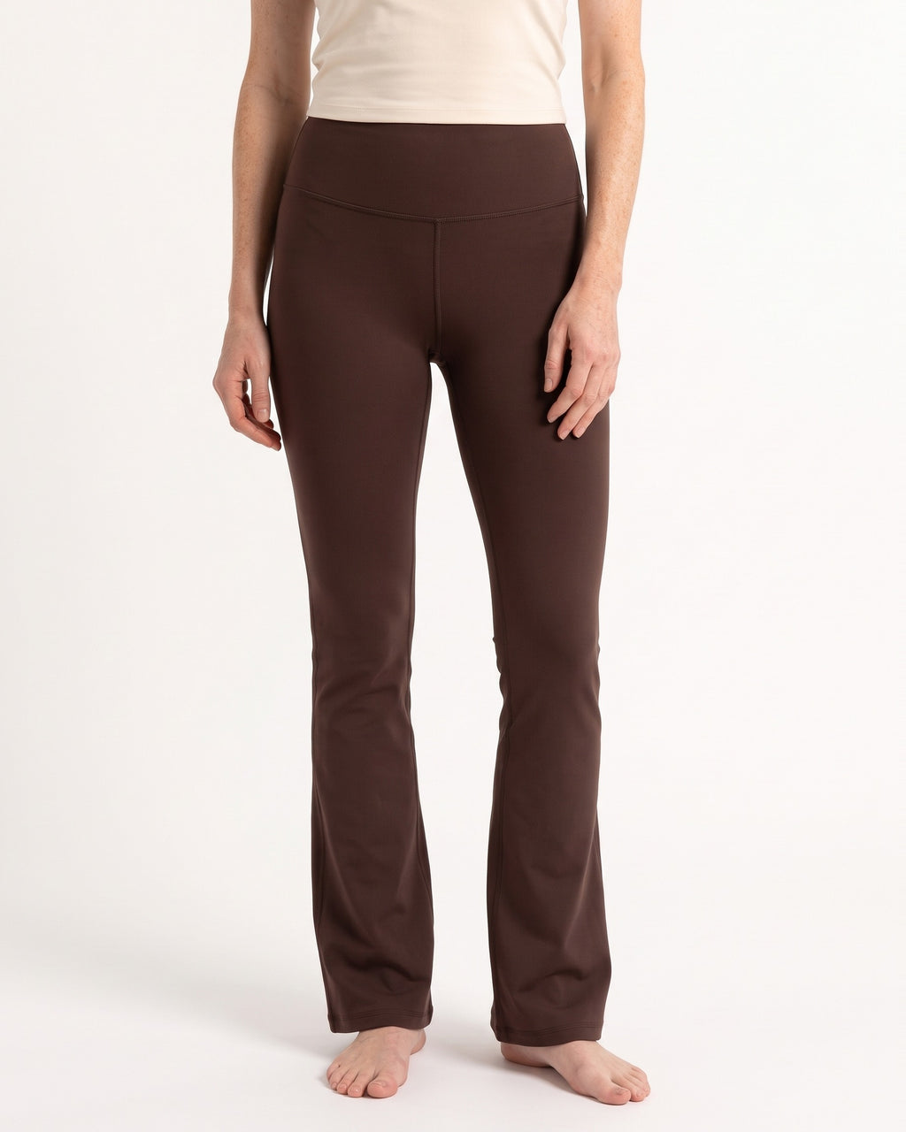 High-waist dark brown flare leggings with tummy-control waistband and contoured back seam