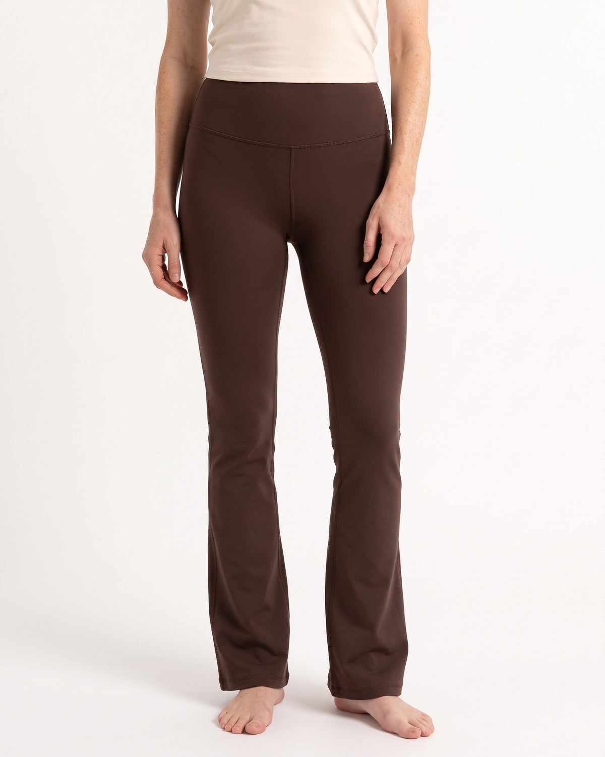High-waist dark brown flare leggings with tummy-control waistband and contoured back seam