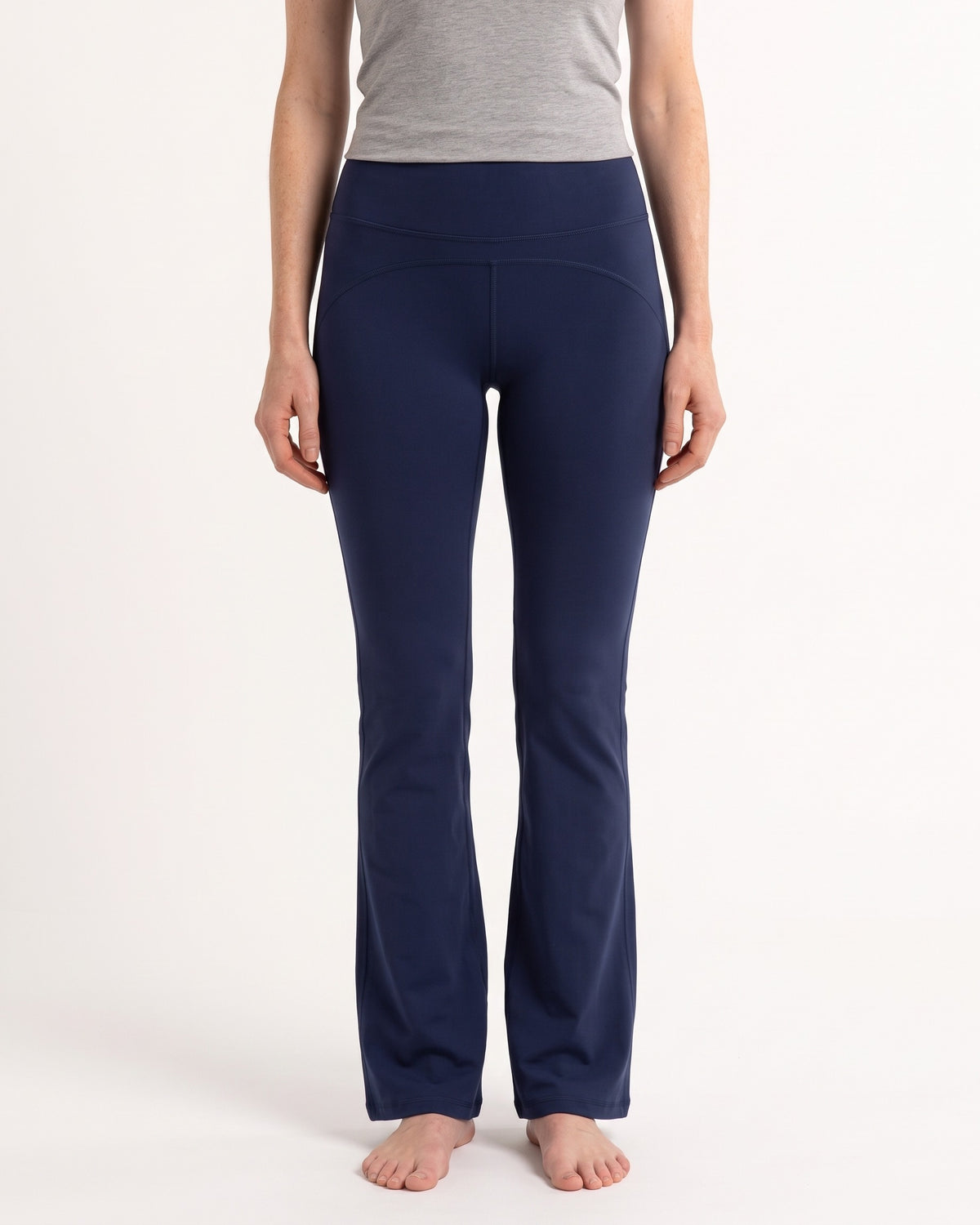 High-waist navy flare leggings with tummy-control waistband and contoured back seam