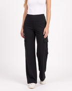 Black wide-leg cargo pants with a high-rise waistband and flap pockets