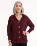 Burgundy hooded knit cardigan with wooden button front, oversized fit, long sleeves