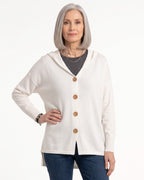 White hooded knit cardigan with wooden button front, relaxed oversized fit