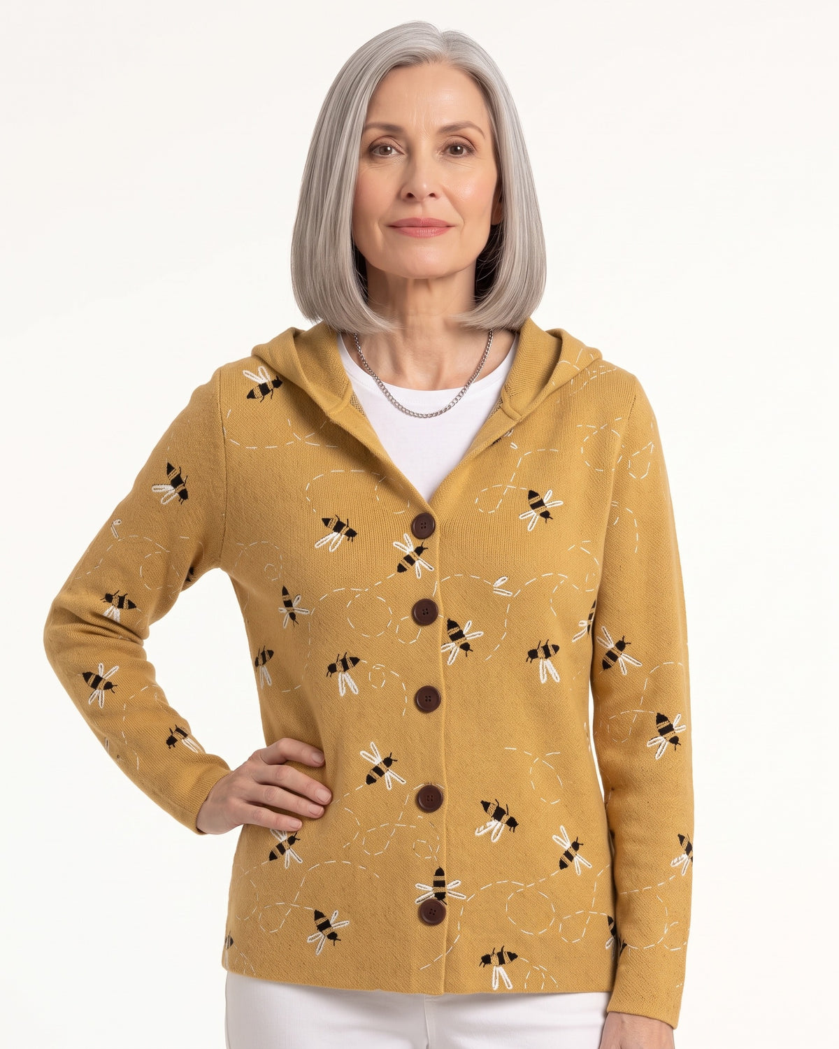 Women’s hooded cardigan with mustard knit, printed button-front and hood