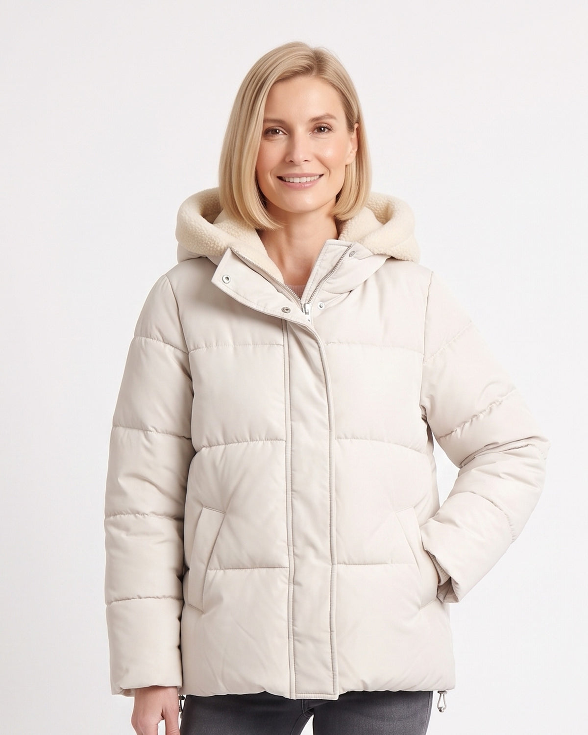 Off-white hooded puffer jacket with zip front, padded sleeves, and adjustable hood