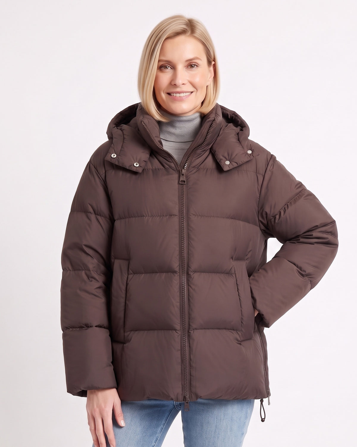 Women's dark brown hooded puffer jacket with front zip, snap pockets, side vents