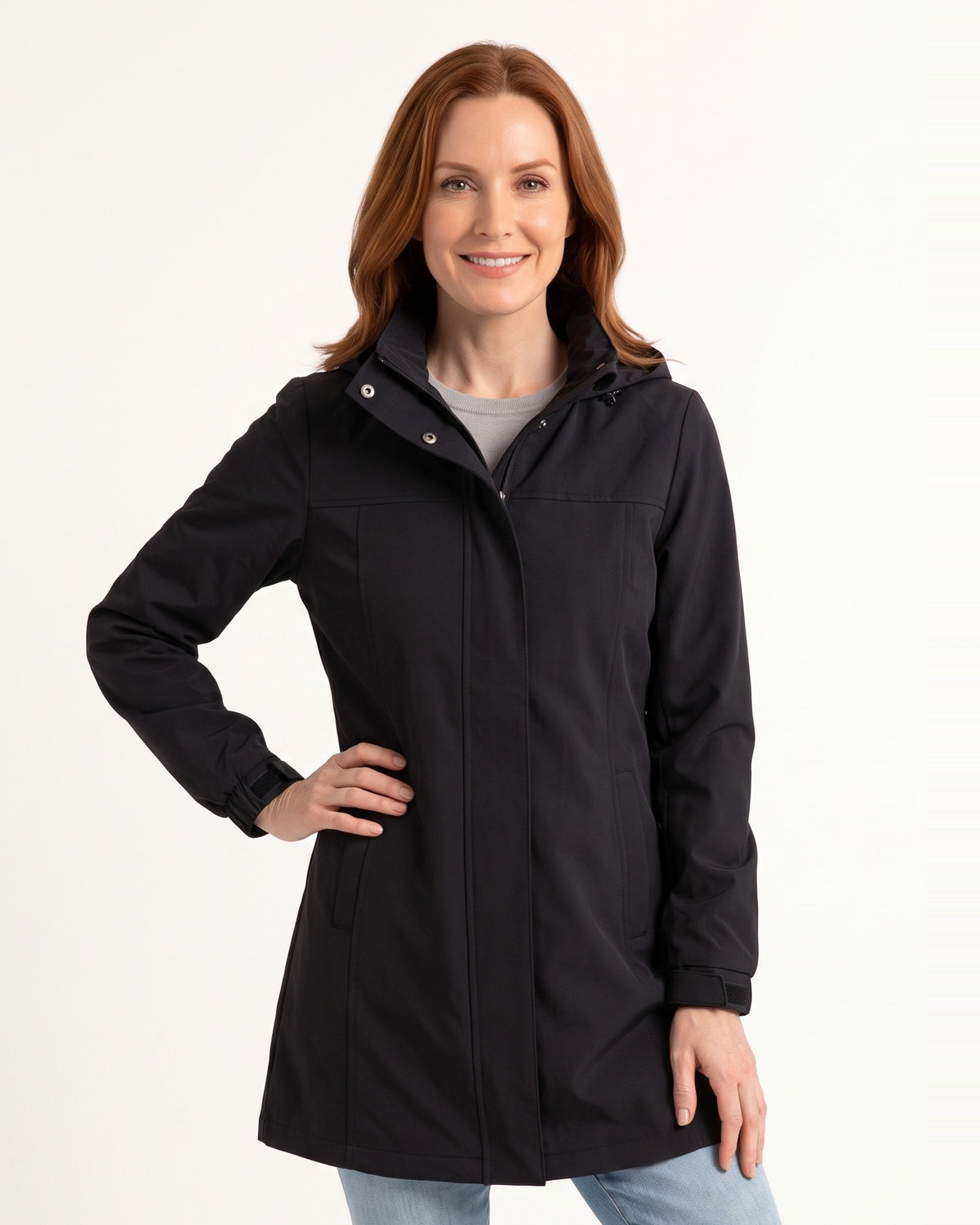 Women's long hooded rain jacket in black with detachable hood and front zip