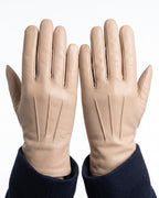 Camel leather gloves with straight finger seams, fleece-lined winter style.