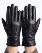 Black leather gloves with stitched finger panels, fleece-lined winter style.