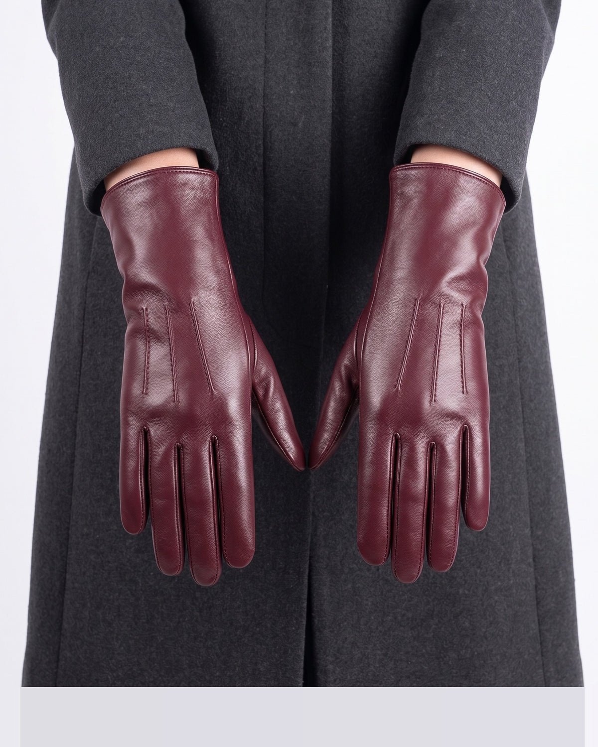 Women’s burgundy leather winter gloves, fleece-lined cuffs and five-finger design