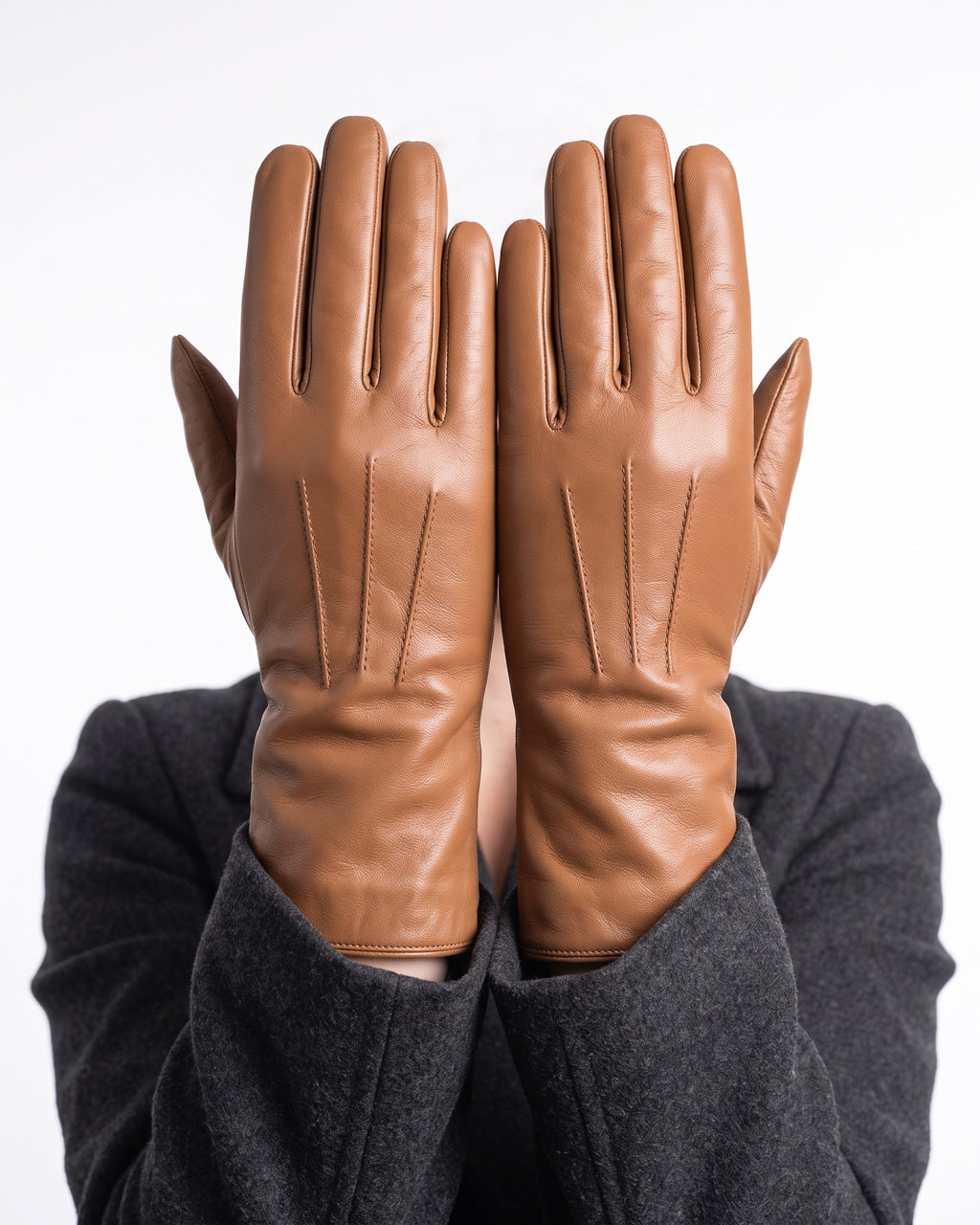 Camel leather winter gloves with gray fleece lining and contrast seam stitching