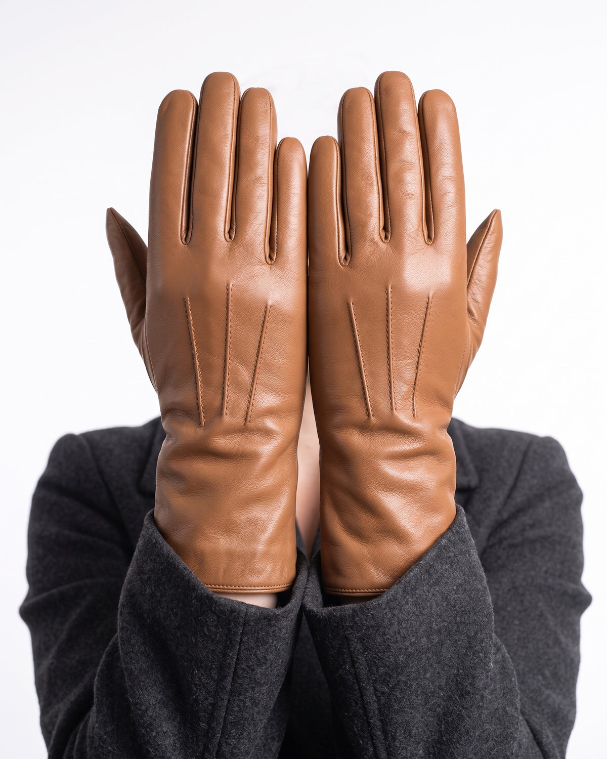 Camel leather winter gloves with gray fleece lining and contrast seam stitching