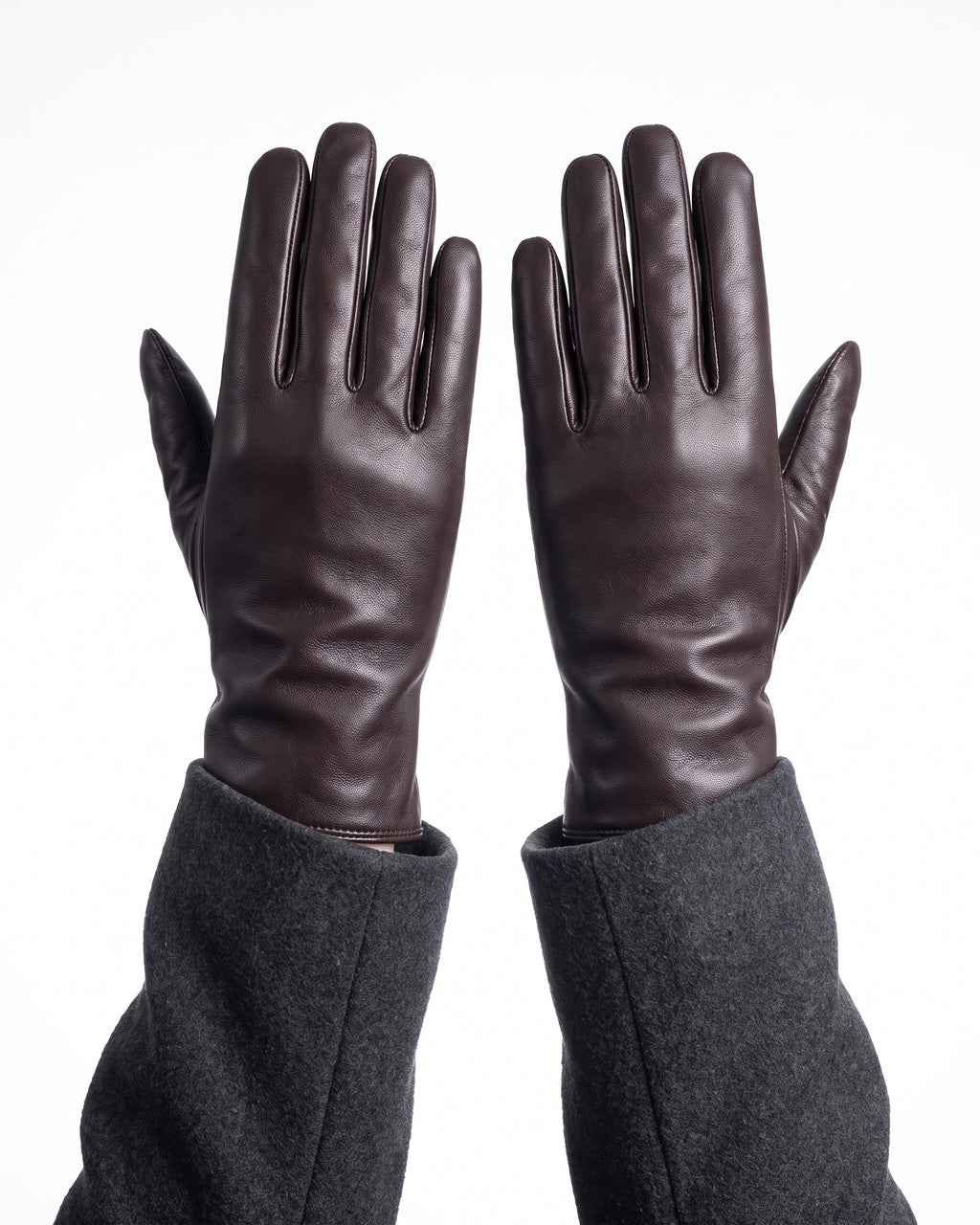 Dark brown leather winter gloves with gray fleece lining and long stitched cuffs