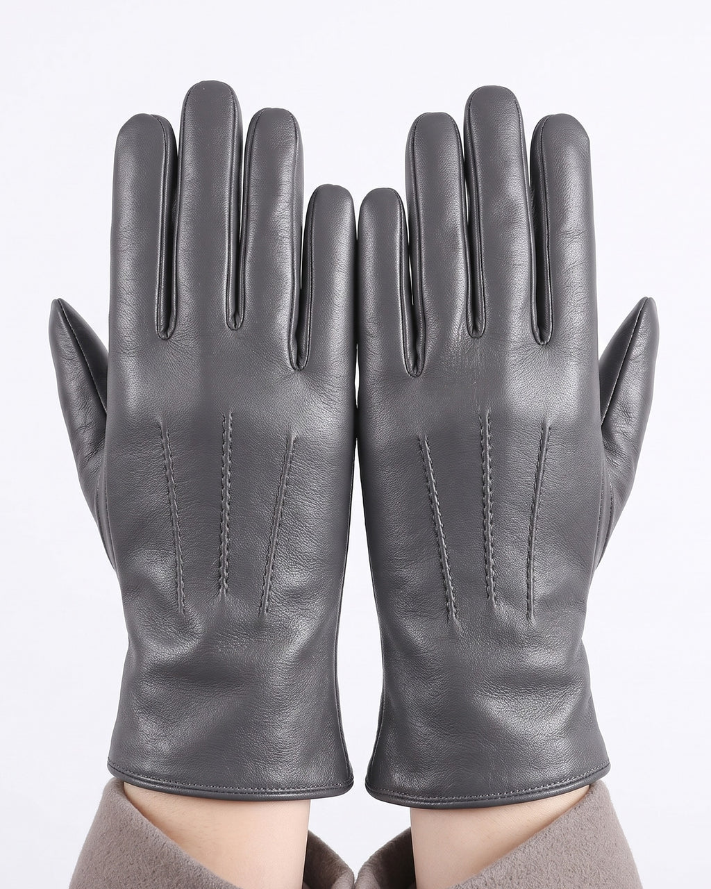 Dark gray leather gloves with stitched finger panels, fleece-lined winter style.