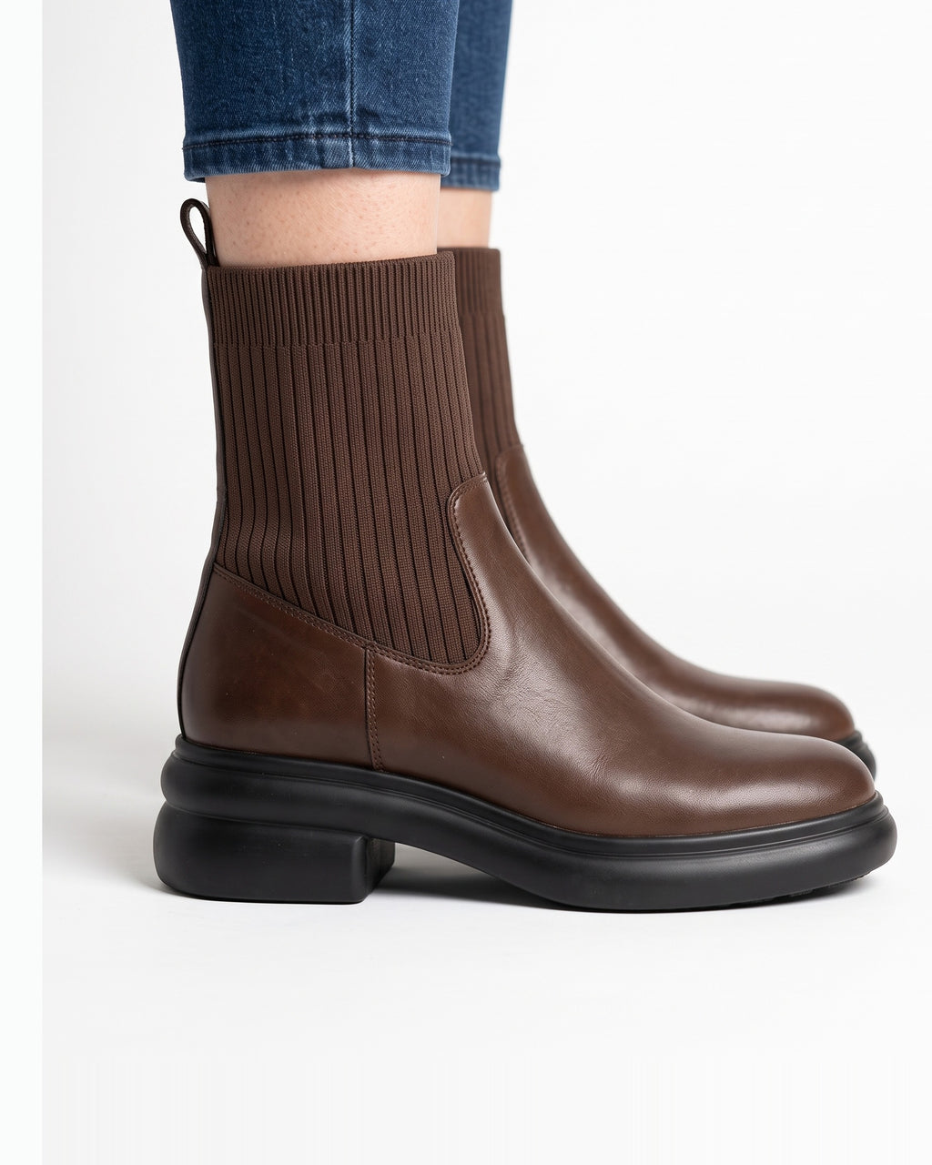 Brown leather sock ankle boots with ribbed knit shaft, back zip, chunky platform sole