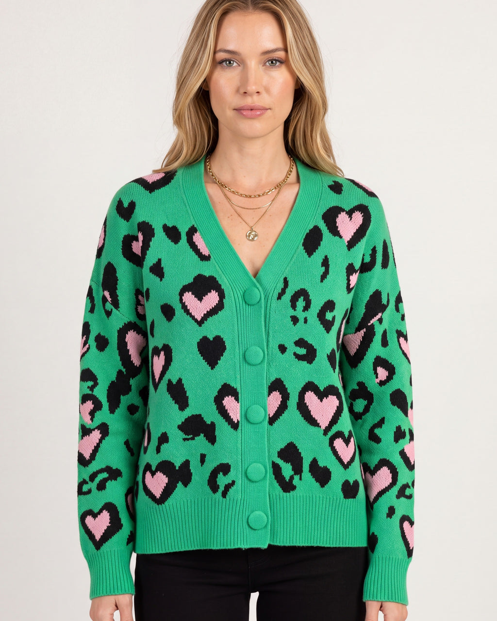 Women’s leopard print cardigan in green with heart motif, v-neck button front knit