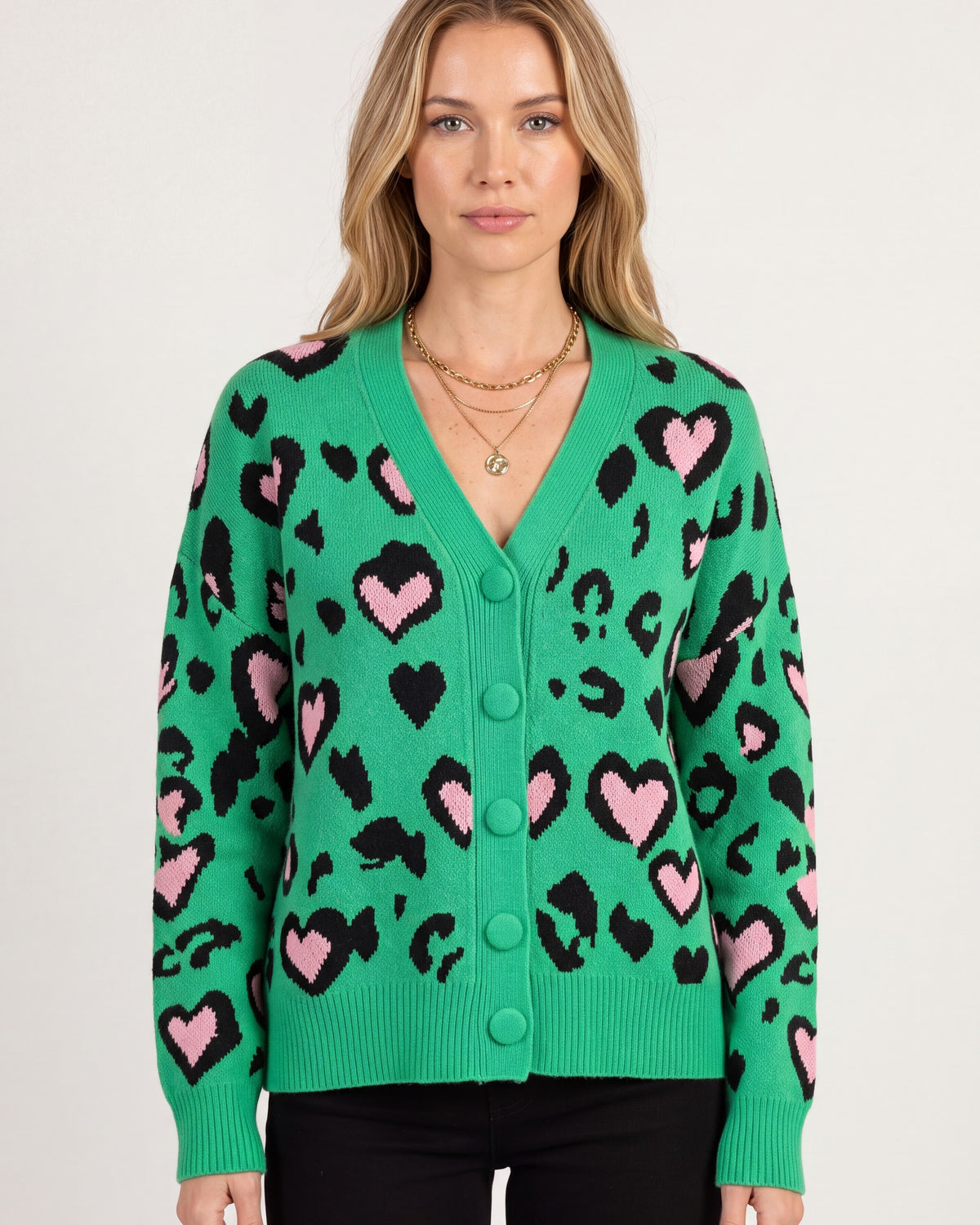 Leopard Print Cardigan for Women — Oversized V Neck Button Front Knit with Heart Motif in Green — studio model photo [ai-studio]