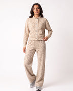 Beige leopard-print two-piece: button-front stand-collar jacket and wide-leg pants