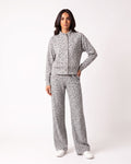 Gray leopard-print two-piece: button-front stand-collar jacket and wide-leg pants