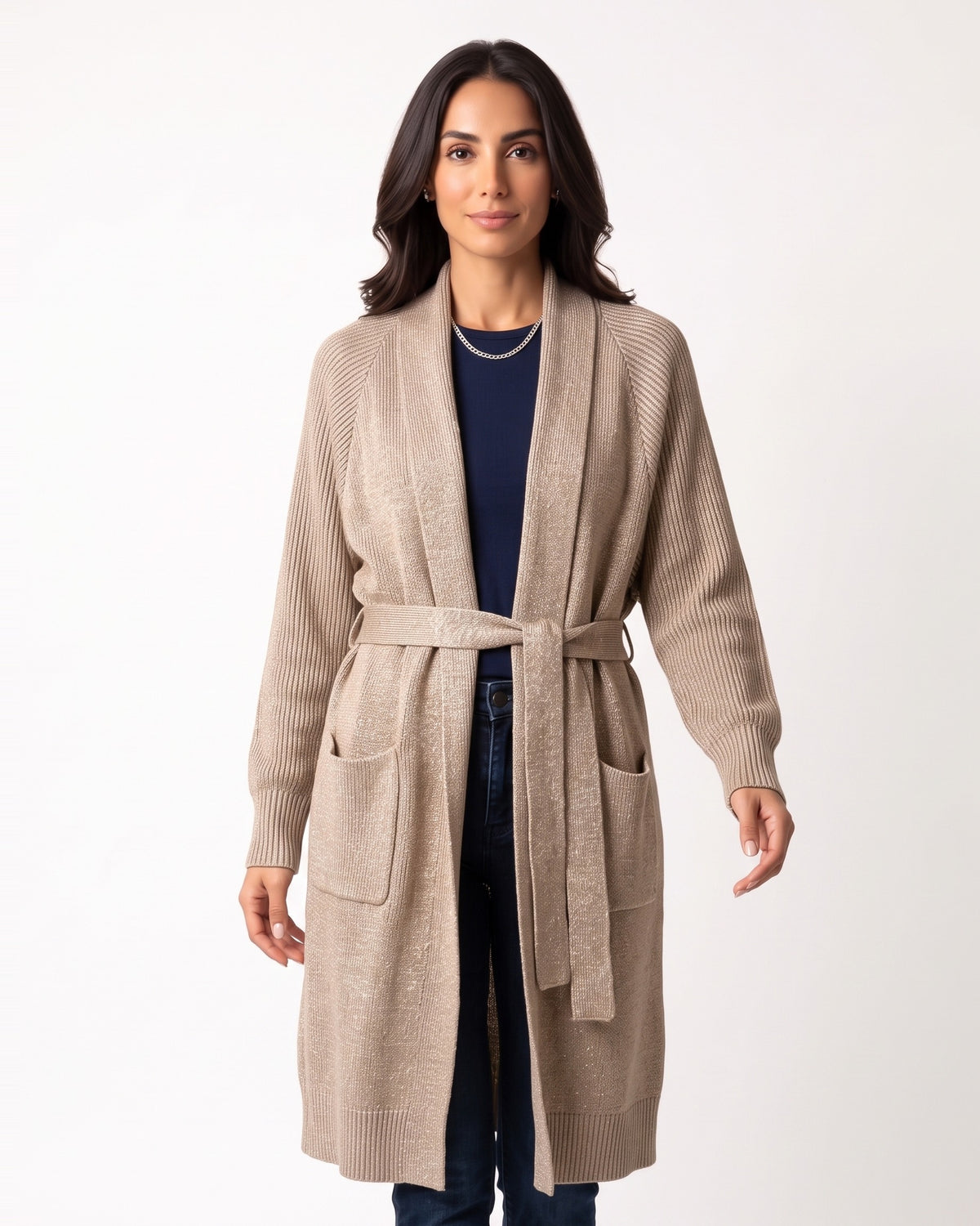 Beige knit cardigan with shawl collar, belt tie, and patch pockets