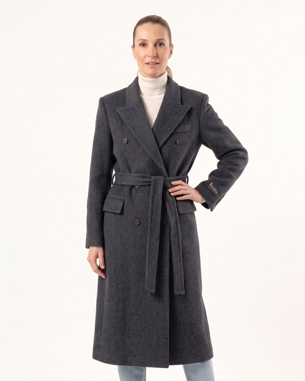 Women’s charcoal gray wool coat, belted longline with peak lapels and flap pockets
