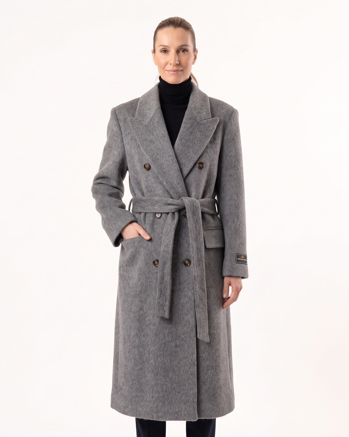 Women’s medium gray wool coat, double-breasted with belt tie and peak lapels