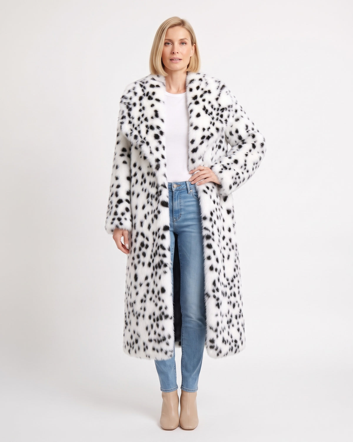 Long white faux fur coat with black spots, wide collar, and open front