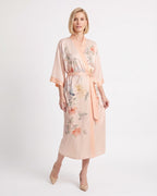 Peach satin kimono robe with delicate floral illustrations, V-neck, wide sleeves, tie belt.