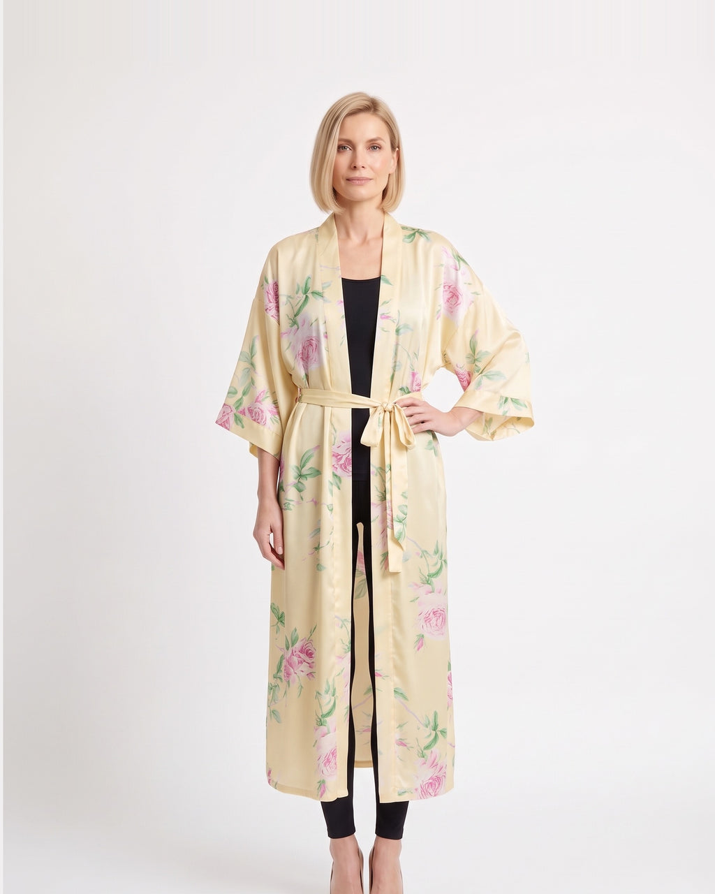 Light cream satin kimono robe with pastel floral print, open front, wide sleeves, tie belt.