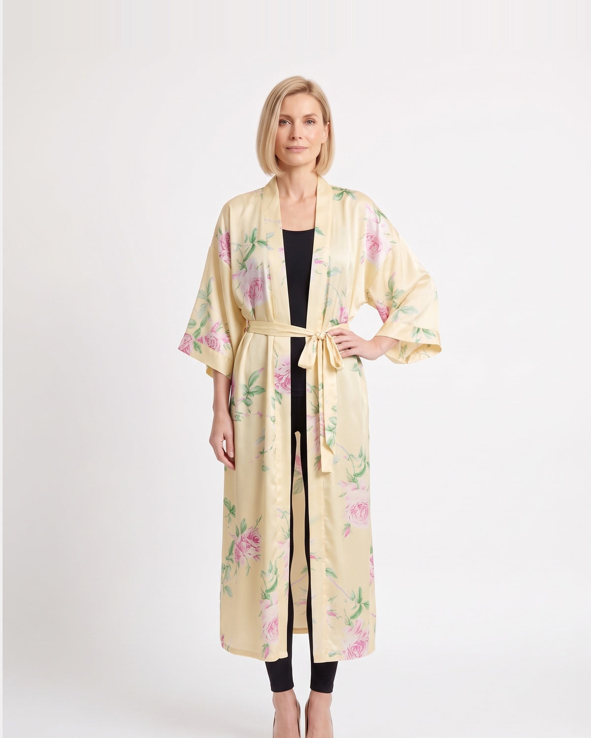 Light cream satin kimono robe with pastel floral print, open front, wide sleeves, tie belt.