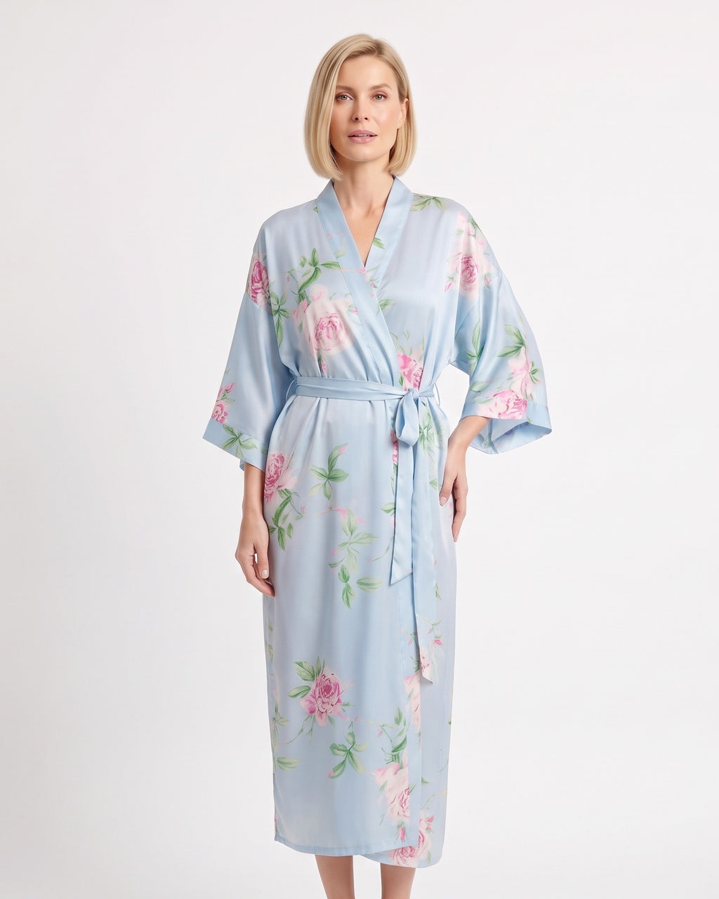 Light blue satin wrap kimono robe with pastel floral print, wide sleeves, and tie belt