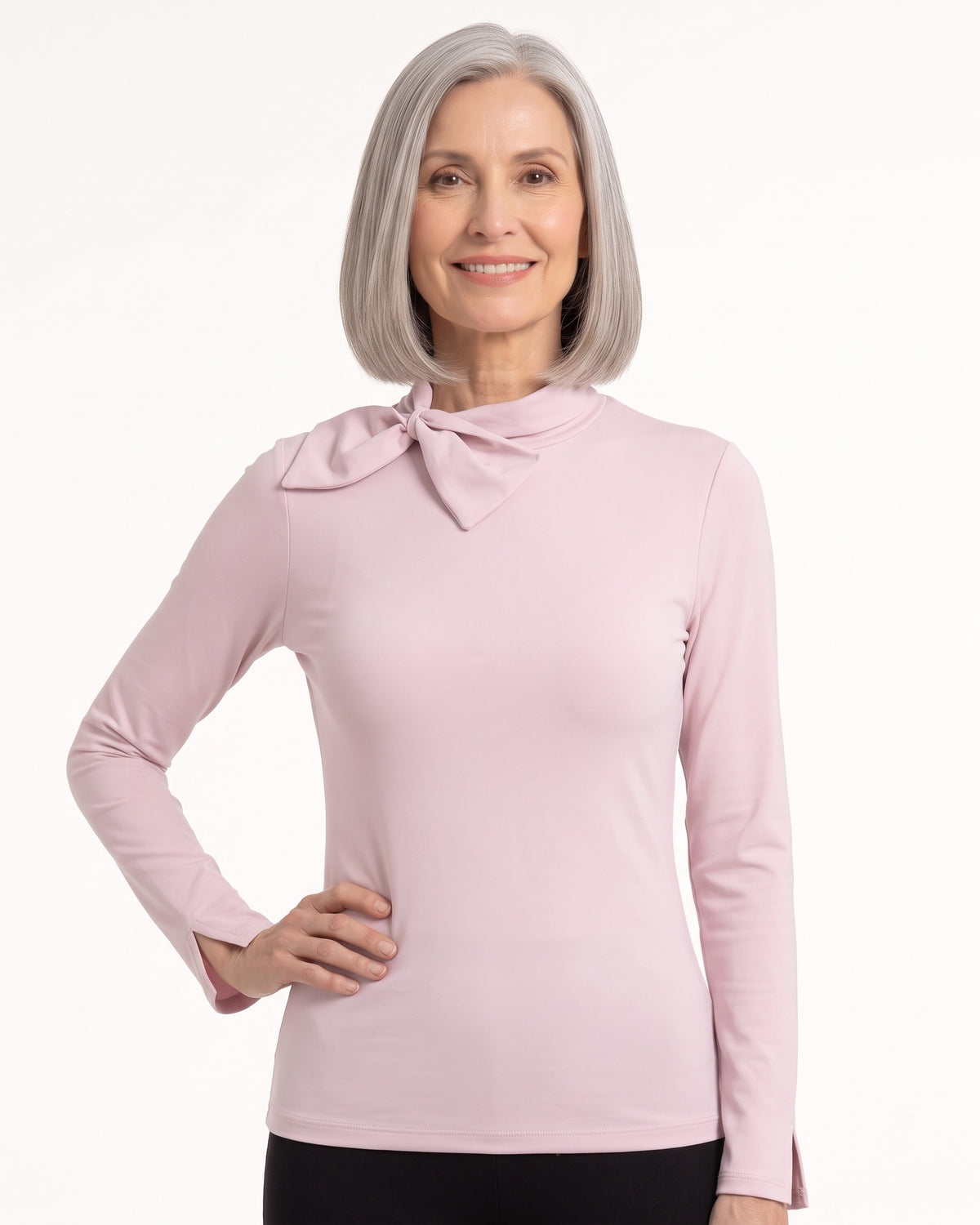 Light pink long-sleeve mock neck top with bow tie collar and slim fit.