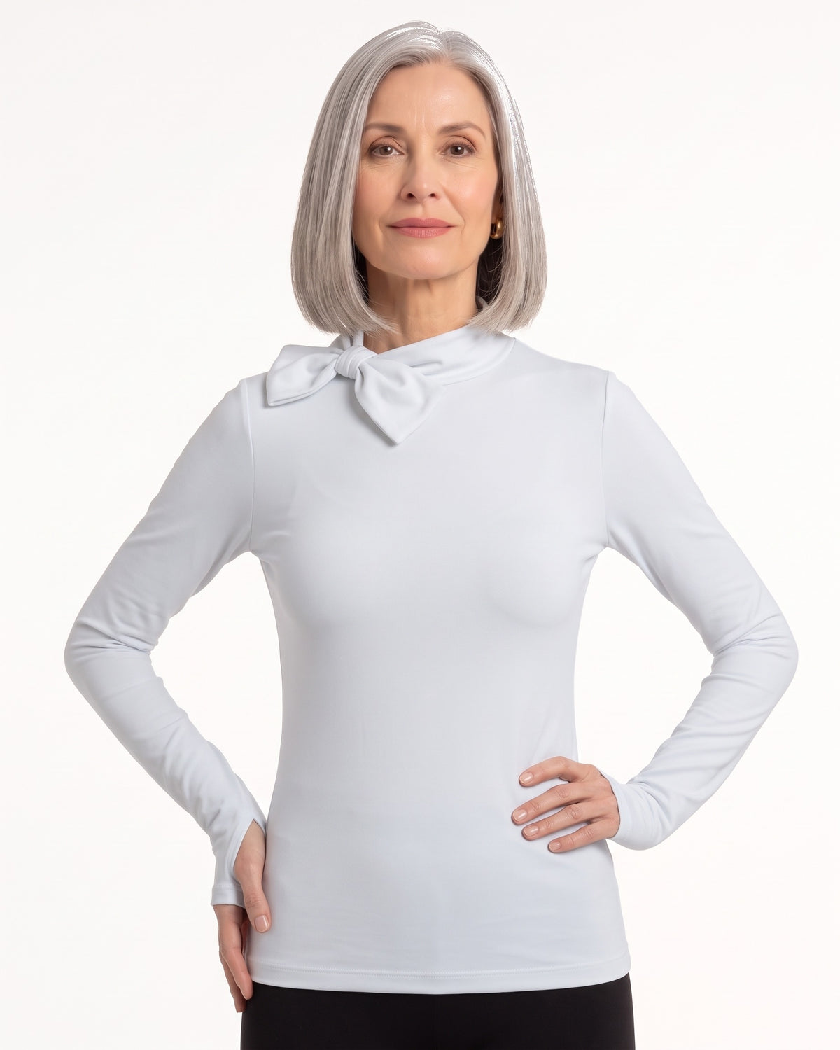 White long-sleeve mock neck top with bow tie collar and slim fit.