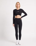 Black long-sleeve seamless crop top and scrunch leggings set, ribbed knit