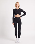 Black long-sleeve seamless crop top and scrunch leggings set, ribbed knit