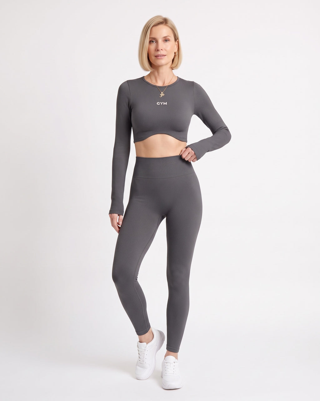 Dark gray long-sleeve seamless crop top and scrunch leggings set, ribbed knit