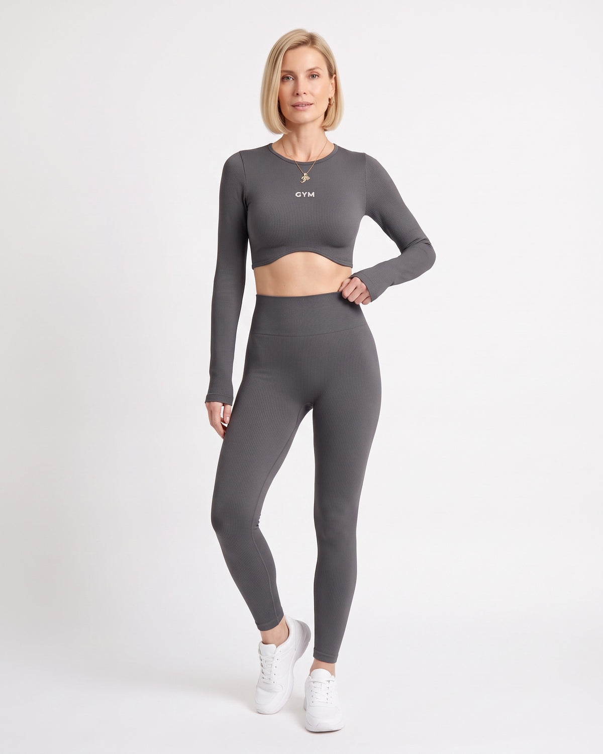 Dark gray long-sleeve seamless crop top and scrunch leggings set, ribbed knit