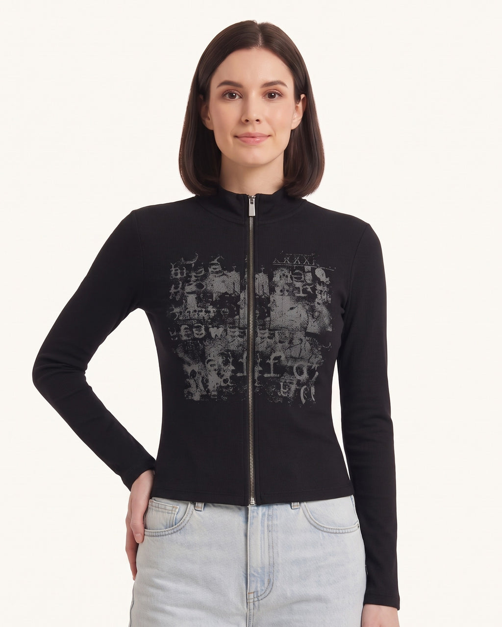 Black long-sleeve zip-up top with stand collar and distressed graphic front