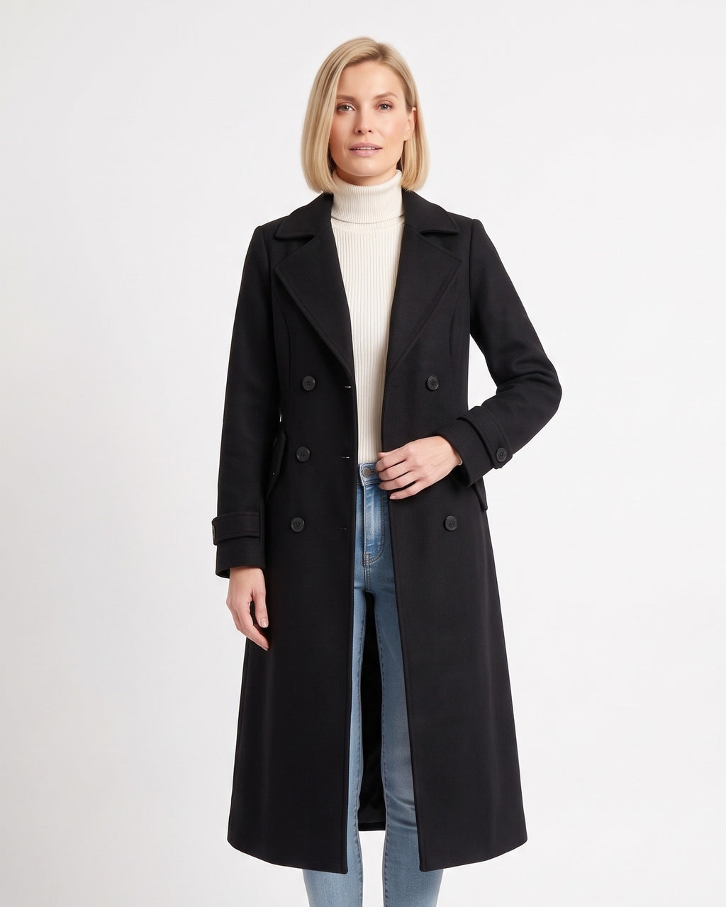 Long black double-breasted wool coat with notch lapels and button cuff tabs