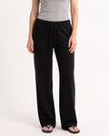 Black low-rise wide-leg sweatpants with drawstring waist and side pockets