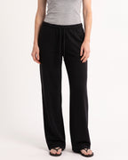 Black low-rise wide-leg sweatpants with drawstring waist and side pockets