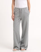 Gray low-rise wide-leg sweatpants with drawstring waist and side pockets