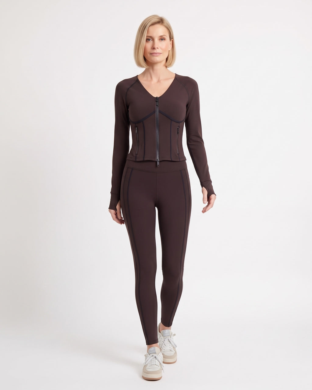 Dark brown workout set with cropped zip jacket and fitted leggings