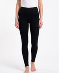 Women's black merino wool thermal leggings, full-length with smooth waistband.