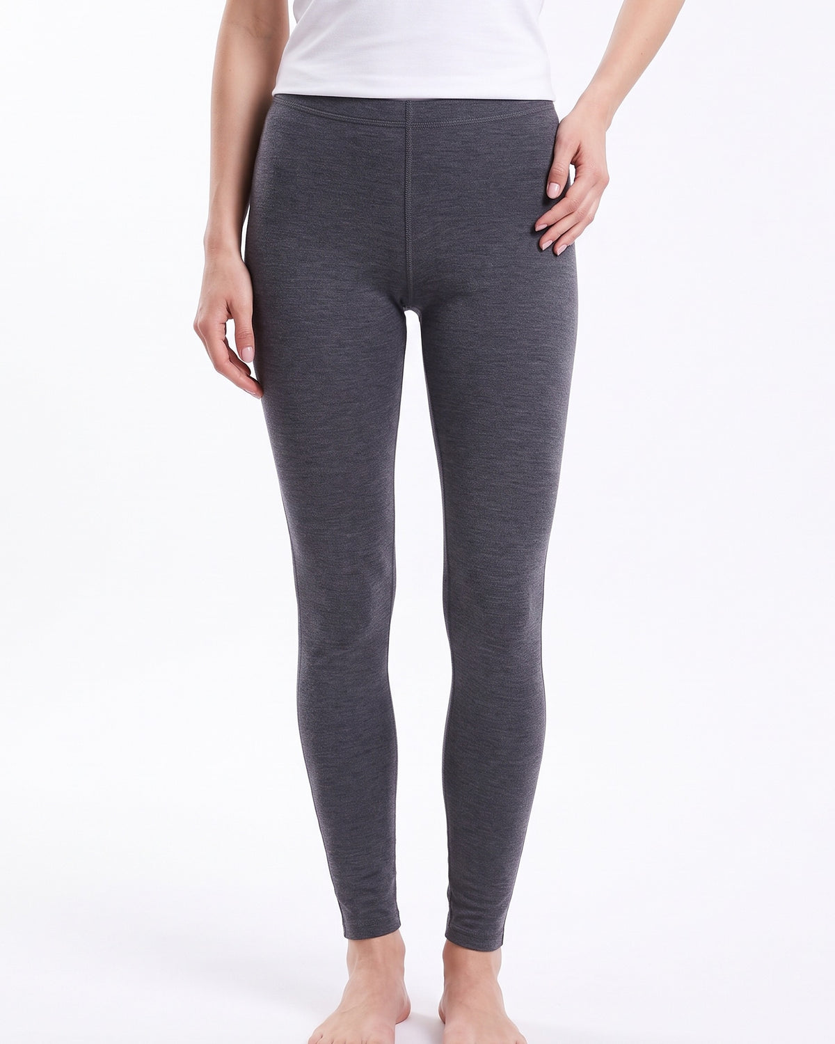 Women's dark gray merino wool thermal leggings, full-length with elastic waistband.