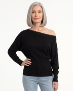 Black off-shoulder cropped knit sweater with long batwing sleeves and ribbed waist detail
