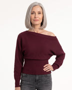 Burgundy off-shoulder cropped knit sweater with long batwing sleeves and ribbed waist detail