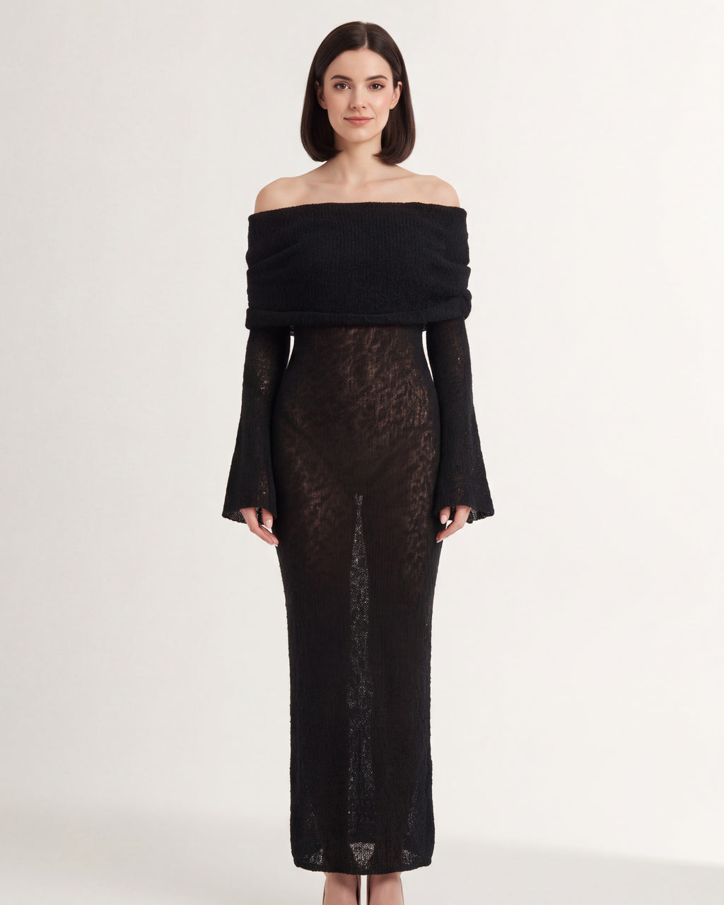 Off-shoulder long-sleeve knit maxi dress in black, column silhouette with wide neckline.