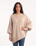 Women's oversized batwing crewneck sweater, beige knit with ribbed cuffs and asymmetric hem
