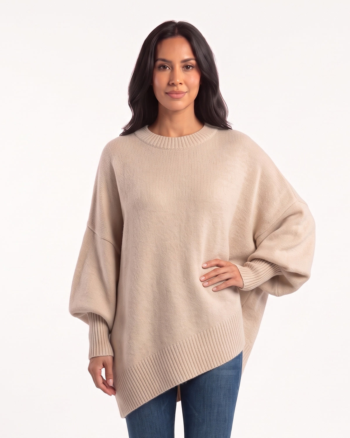 Women's oversized batwing crewneck sweater, beige knit with ribbed cuffs and asymmetric hem