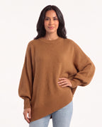 Women's oversized batwing crewneck sweater, camel knit with ribbed cuffs and asymmetric hem